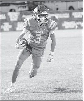 Seminole Chieftains wide receiver Kenneth Johnson III finds some open space Friday. Courtesy Photo by Ben Schatzel