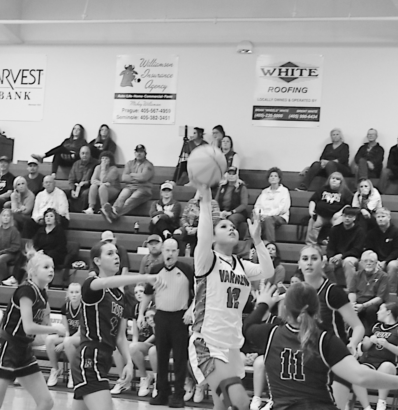 Varnum Lady Whippet Alyviah Lena goes up for the basket Tuesday night. Staff Photo by Andy Wilson
