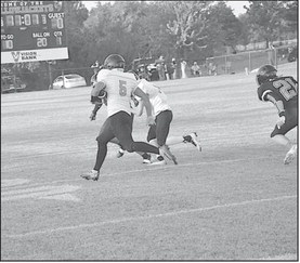 Maud Tiger Juliouz Brown breaks away for a first down Friday night. Staff Photo by Bill Anderson