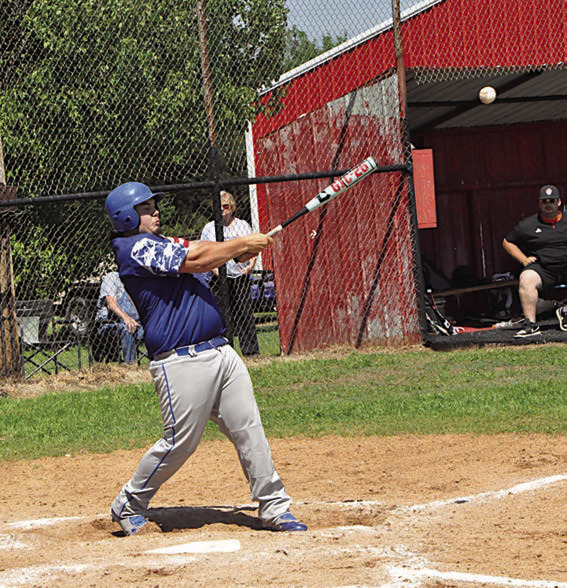 Bowlegs Bison Kolten Beaver knocks the ball out to the outfield Thursday against Maud. Bowlegs lost 2-14. Staff Photo by Bill Anderson