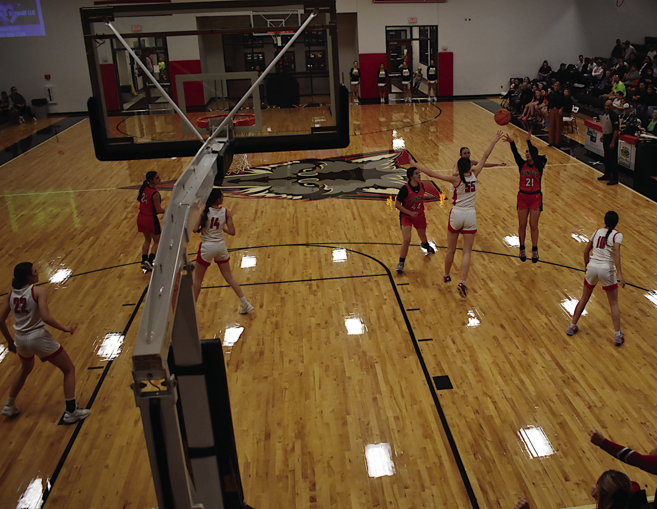 Konawa Lady Tiger Kassidi Lowden shoots from the field over her defender Thursday. Staff Photo by Andy Wilson