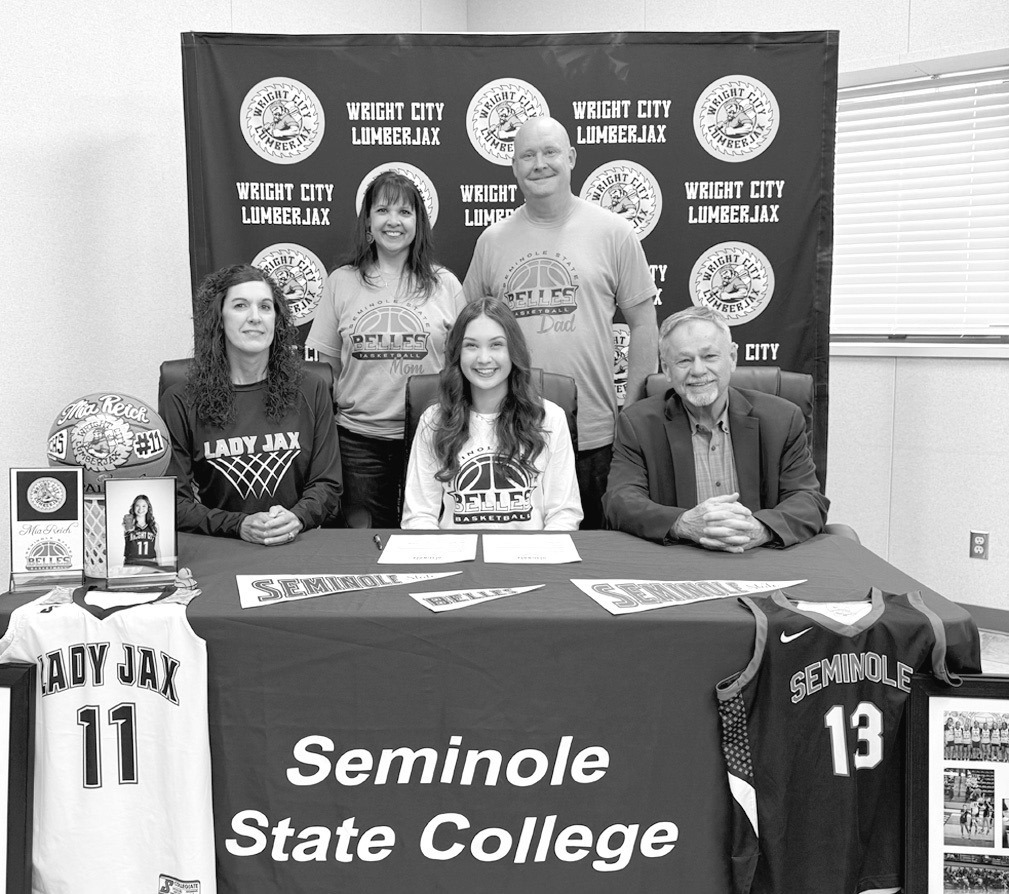 Mia Reich of Wright City High School has signed a letter of intent to play basketball for Seminole State College. Pictured sitting l-r: Wright City basketball coach Misty Haley, Mia Reich and Seminole State Coach Randy Wassam. Standing are Mia’s parents