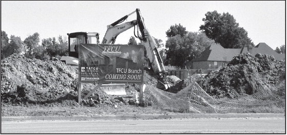 The landscape along Wrangler Blvd. near the East Gate housing addition is undergoing change, as a Tinker Federal Credit Union ( TFCU) is building a new branch office. TFCU, which has over 30 locations throughout Oklahoma and Texas, is currently located at