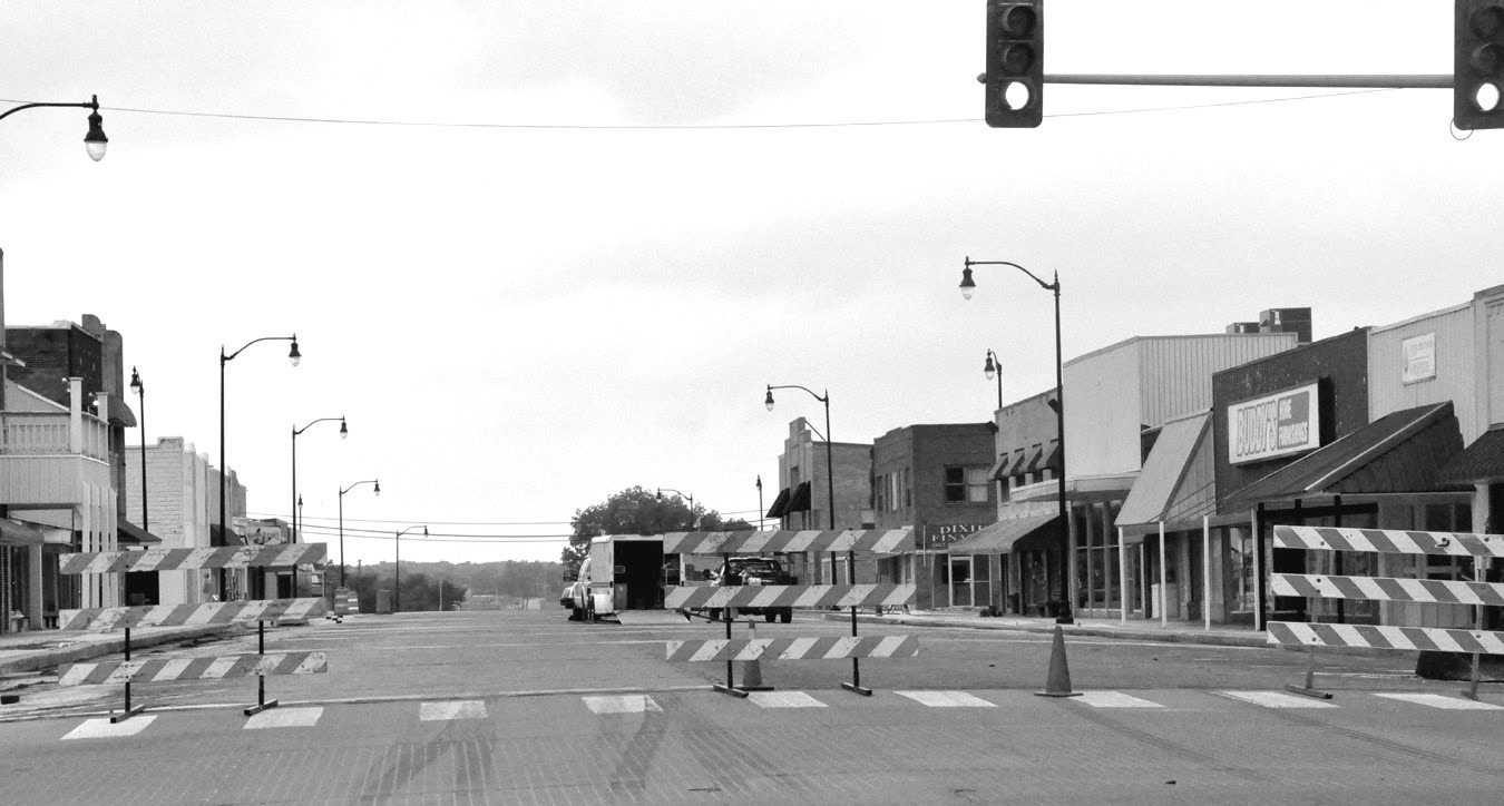 Main Street was closed from Broadway to Seminole Street Monday morning as crews began to prepare to pave over the bricks in the street. A self-leveling asphalt will be put down first followed by a thicker layer. The closure is expected to last through May