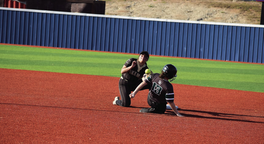 Seminole Lady Chieftain Layla Griffin slides into second base safe Monday afternoon. Staff Photo by Andy Wilson