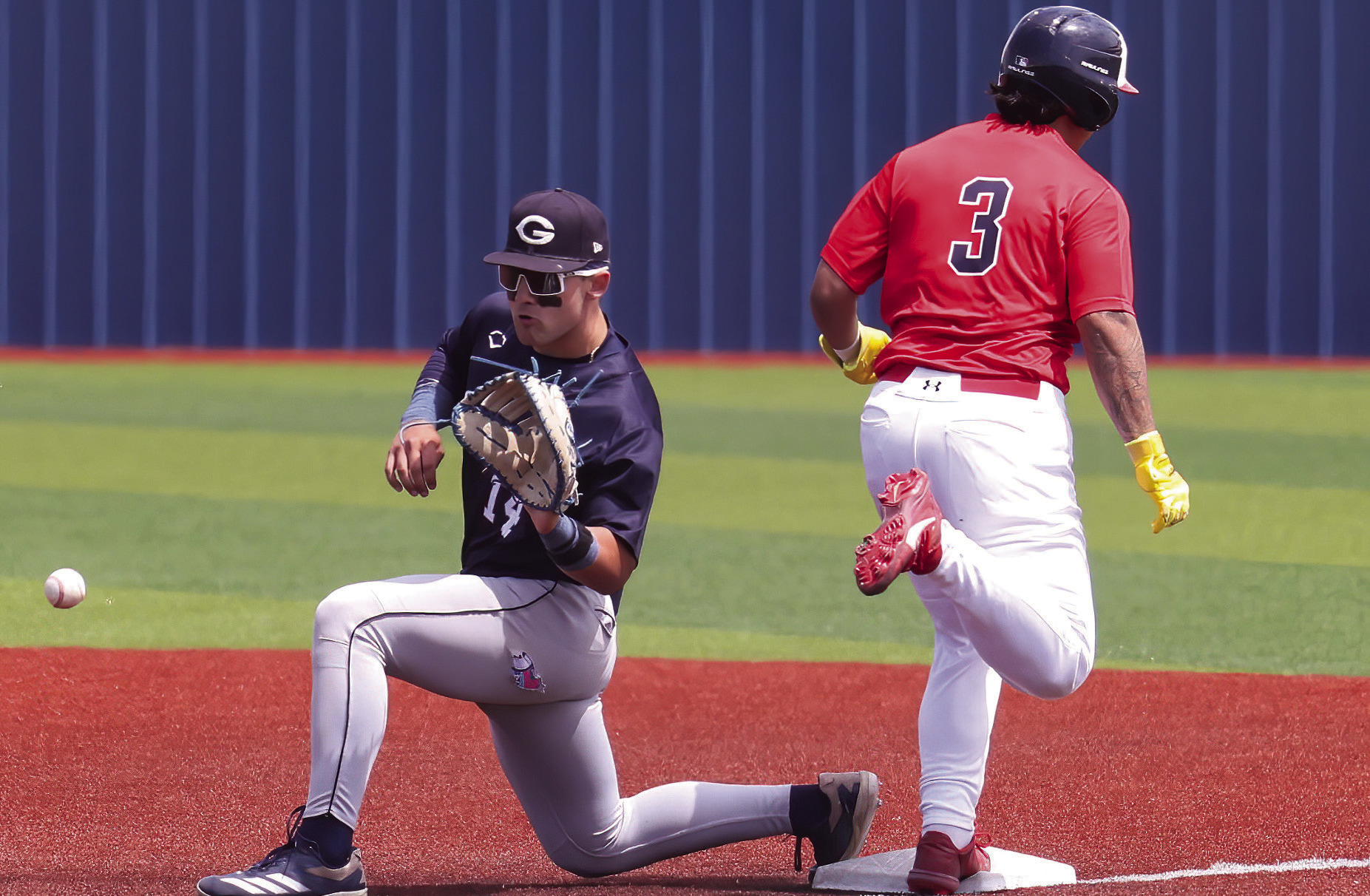 Seminole State Trojan Daniel Restrepo beats the throw to first base Monday afternoon. Courtesy Photo by Glen Bryan