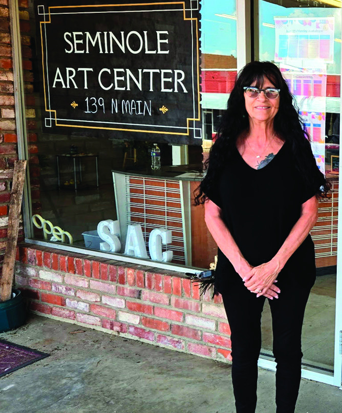 Left, Seminole Arts Council Program Director Deborah Davis is pictured in front of the Seminole Art Center at its new location at 139 N. Main. The larger building has more space for the increase in activities the Arts Council sponsors. The public is invit