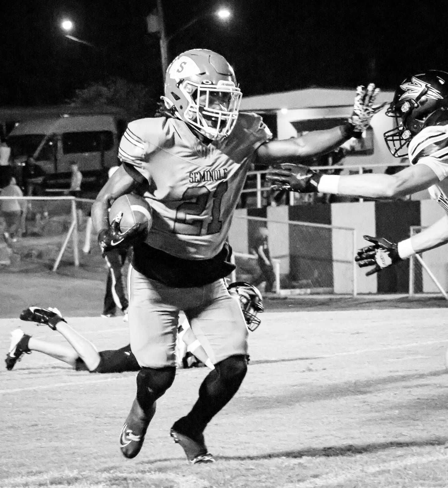 Seminole Chieftain RB Timothy McFadden goes for a stiff arm. Courtesy Photo by Ben Schatzel