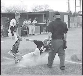 Maud Tiger Connor Hutchens slides into home safe Tuesday afternoon. Staff Photo by Bill Anderson