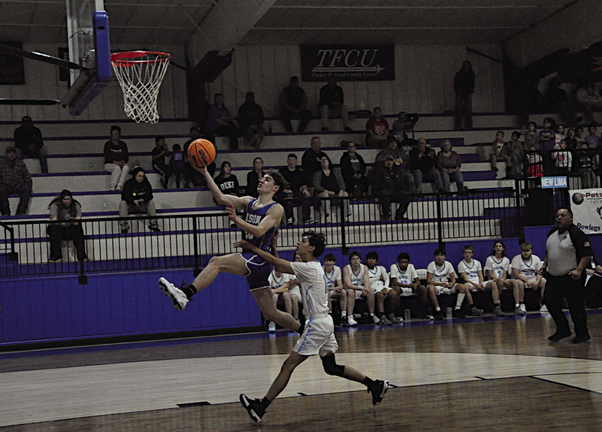 Bowlegs Bison Tyler Lee flies in for the layup Thursday afternoon. Staff Photo by Bill Anderson