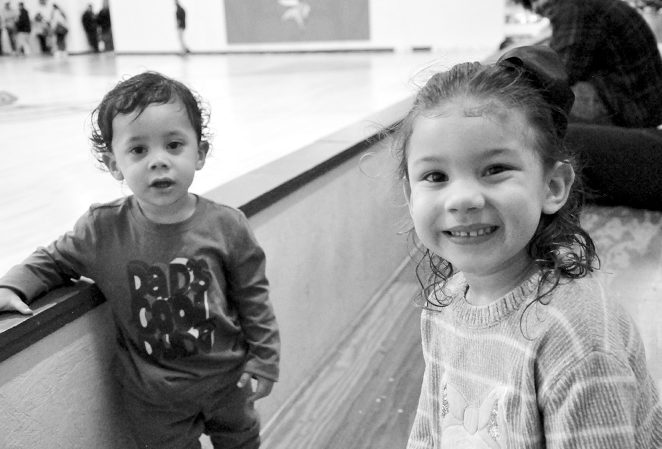 Devantae Olah Jr. and Nevaeh Olah, who were spectators at last Friday’s Sasakwa versus Butner basketball game, had their curiosity piqued by Producer Sports Editor Bill Anderson’s camera. They wanted to know how the equipment worked, so Bill gave them