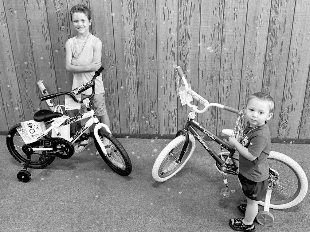 Kallan Wiggins and Christian Dodson were the grand prize winners of shiny new bicycles donated by Walmart in the Seminole Public Library’s Summer Reading Program. Over 60 kids participated in this year’s program. —Courtesy photo
