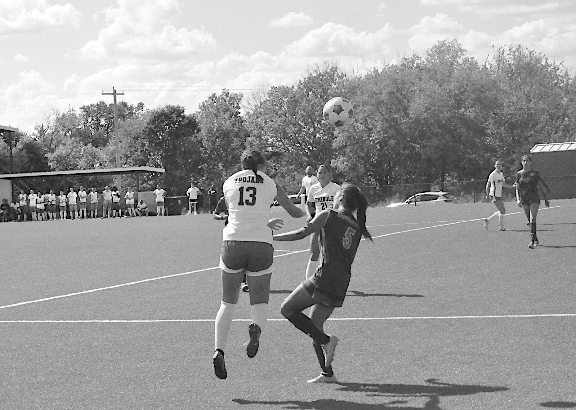 Seminole State Lady Trojan Gracie Lee keeps the ball in play for the Trojans by using her head Sunday afternoon. Seminole State won 8-0 Staff Photo by Bill Anderson