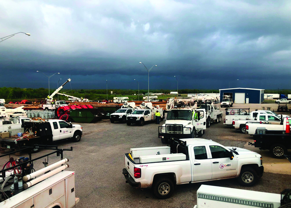 CVEC trucks ready to roll as a storm looms on the horizon. (CVEC photo)