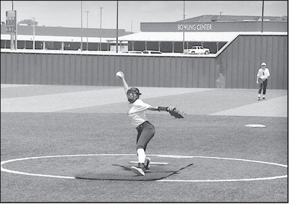 Varnum Lady Whippet Cori Vigil pitches to the waiting Piedmont batter Monday afternoon. Staff Photo by Bill Anderson