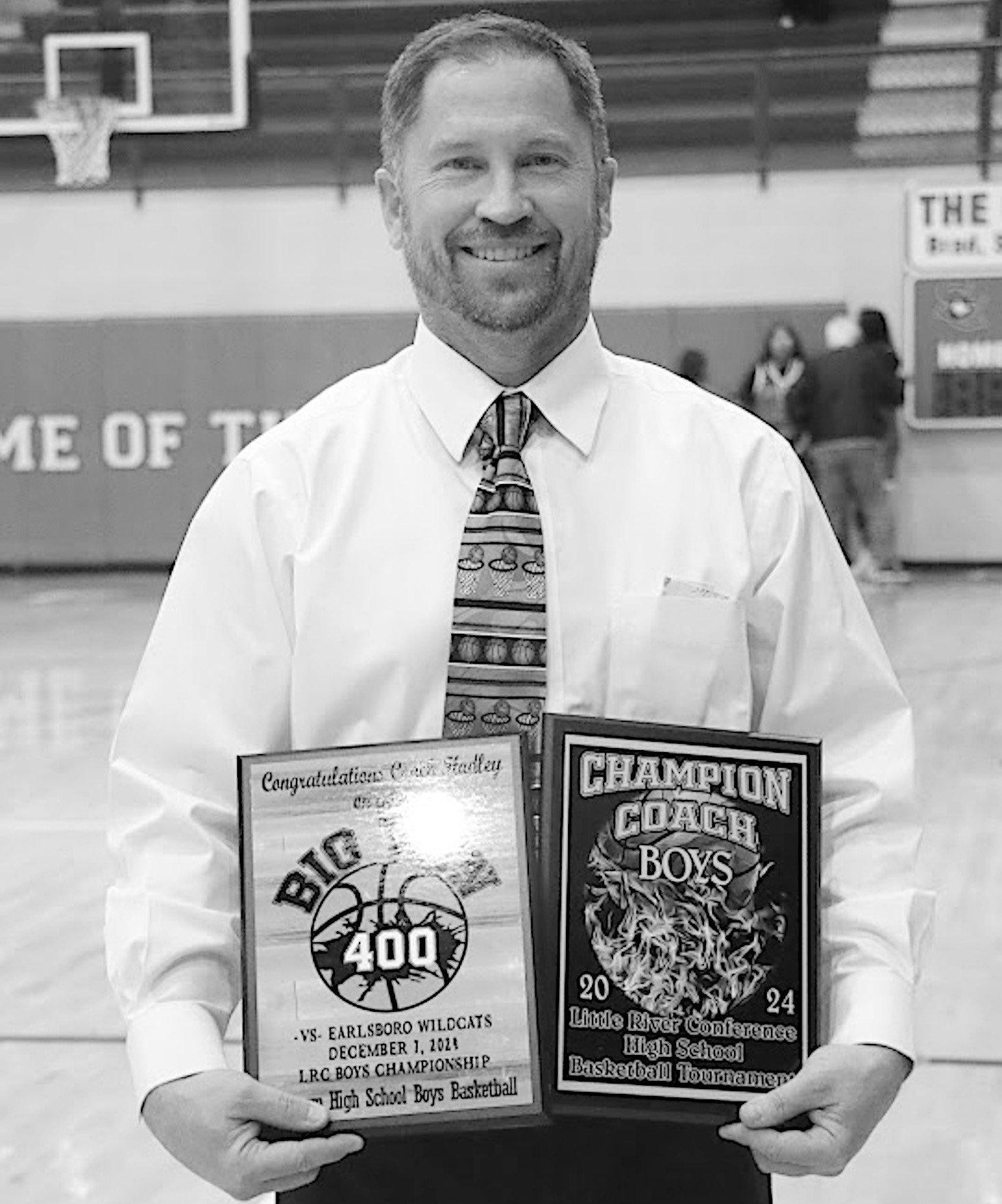 VarnumHeadCoachJonHadleywinshis400thCareer win with the Whippet boys at the LRC Tournament. Courtesy Photo by Jeanne Gosa
