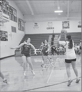 Varnum Lady Whippet Kalea Miller takes a shot from three-point range during Monday’s scrimmage. Staff Photo by Bill Anderson