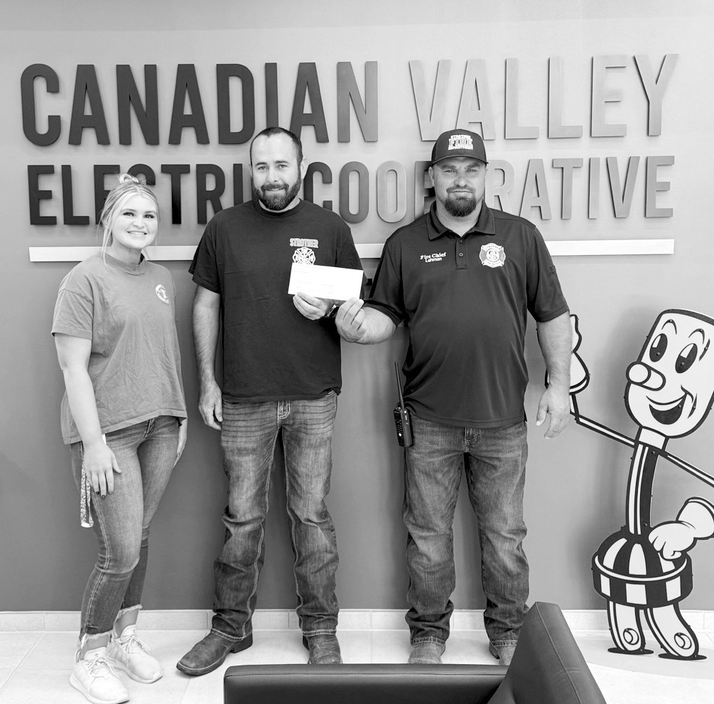 Canadian Valley Electrical Co-op (CVEC) recently presented a grant check to the Strother Volunteer Fire Department through CVEC’s Sharing Success program. Pictured l-r: Kaci Dennis, CVEC; Strother Fire Dept. Captain Derek Young and Ryan Lehman, Strother