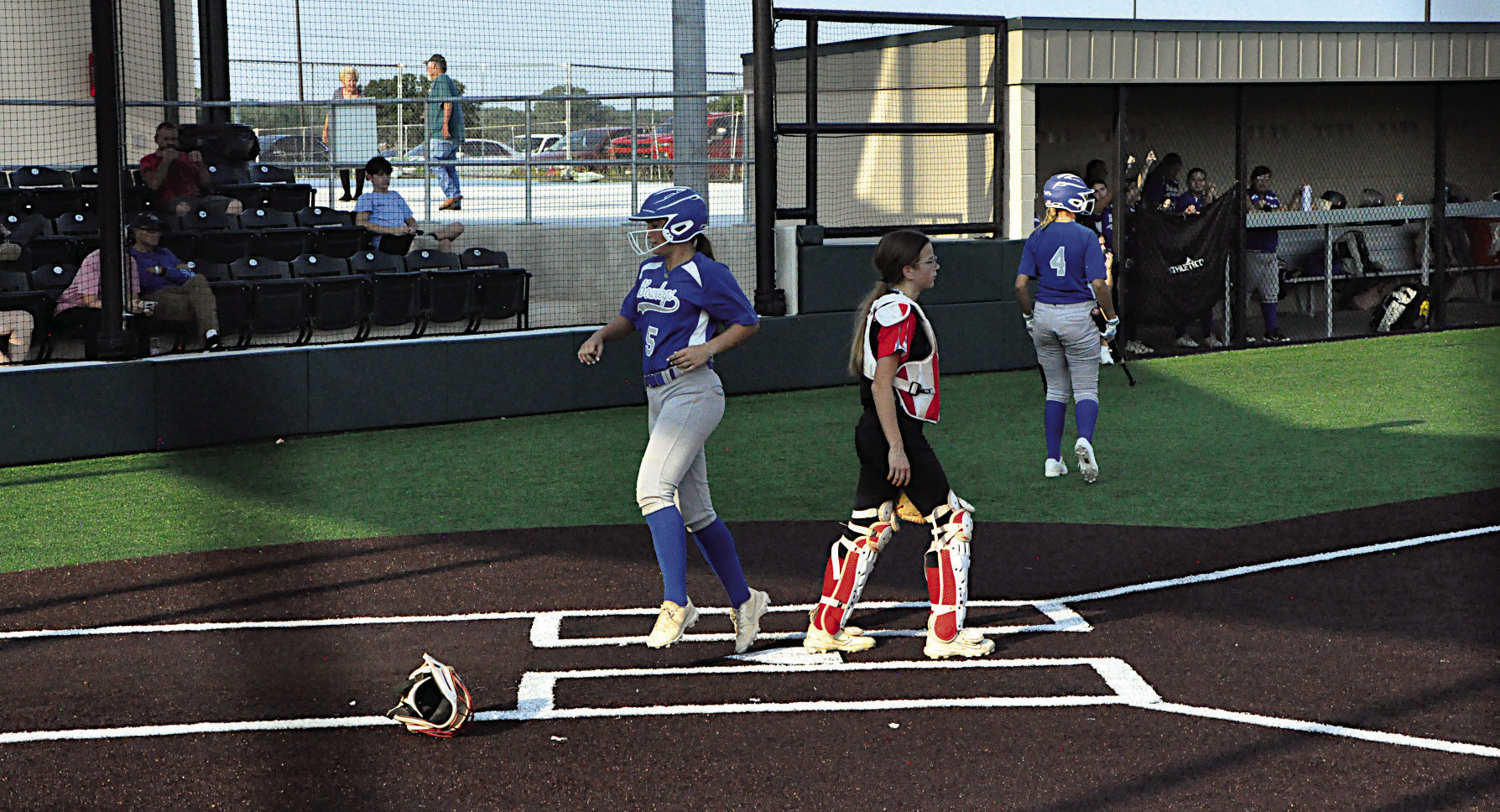 Bowlegs Lady Bison Kloe Oyler scores the run Thursday night at the LRC Tournament. Staff Photo by Bill Anderson