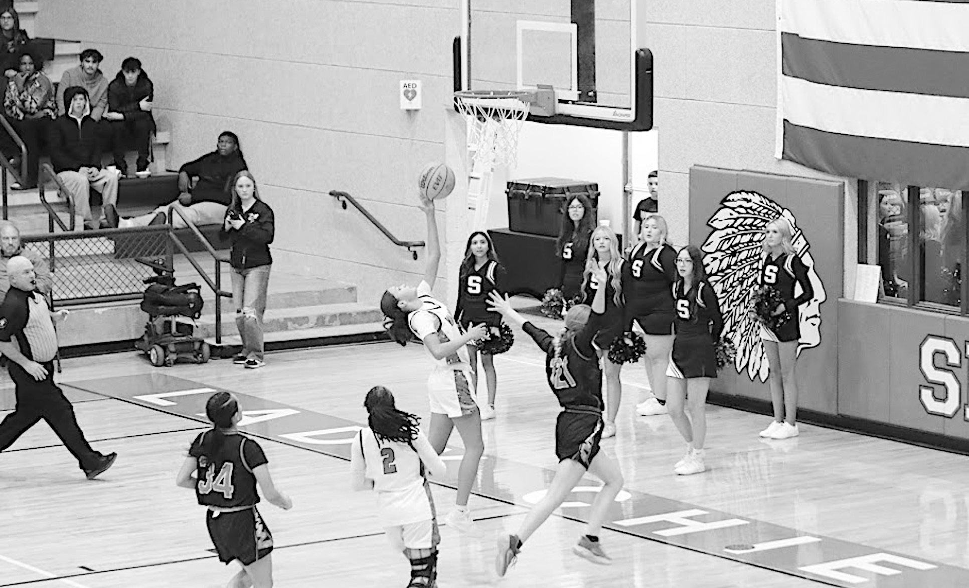 Varnum Lady Whippet Jazmyn Williams goes up for the shot as Strother Lady Yellowjacket Ava Kornelsen tries to block the shot. Varnum won 49-40. Courtesy Photo by Jeanne Gosa