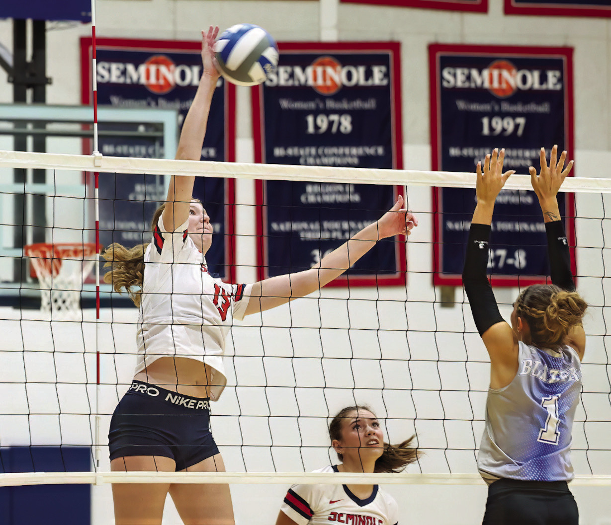 Seminole State Lady Trojan Melanie Long sends the ball back across the net Tuesday. Courtesy Photo by Glen Bryan