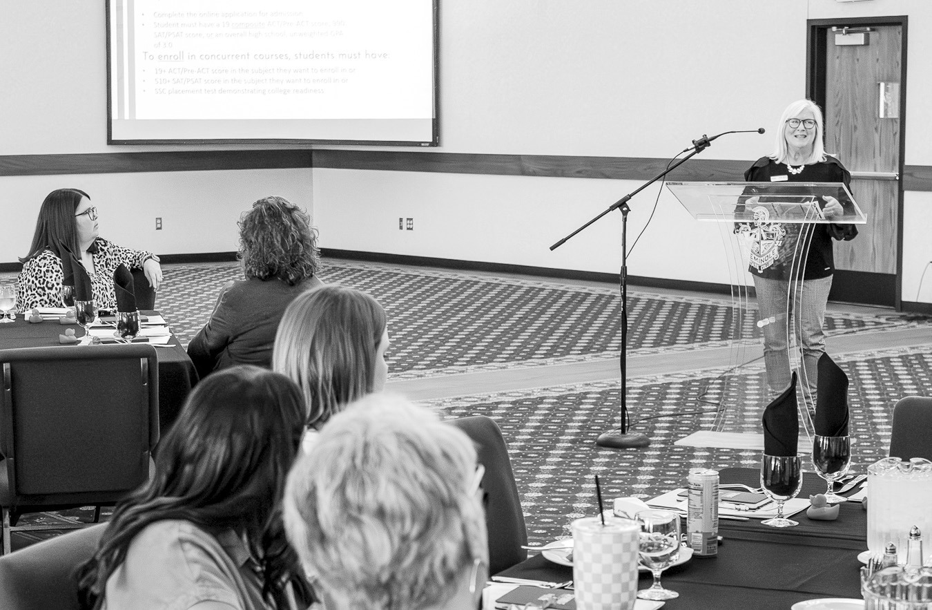 Left, Seminole State College Academic Advisor Cindy Nolen speaks to local high school administrators and counselors during a June 4 workshop about the college’s new free concurrent scholarship initiative in the Enoch Kelly Haney Center. Beginning in fall 2026, eligible high school juniors and seniors in SSC’s five-county service area who qualify for the state concurrent tuition waiver will have fees and books covered through an automatic SSC scholarship. (SSC Photo)