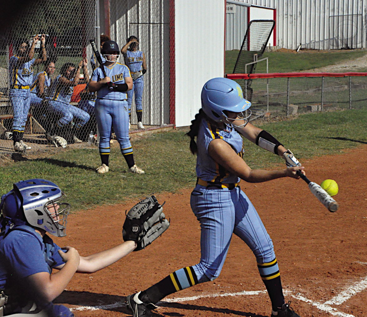 New Lima Falconette Jaylee Ipock gets a hold of one Thursday afternoon. Staff Photo by Bill Anderson
