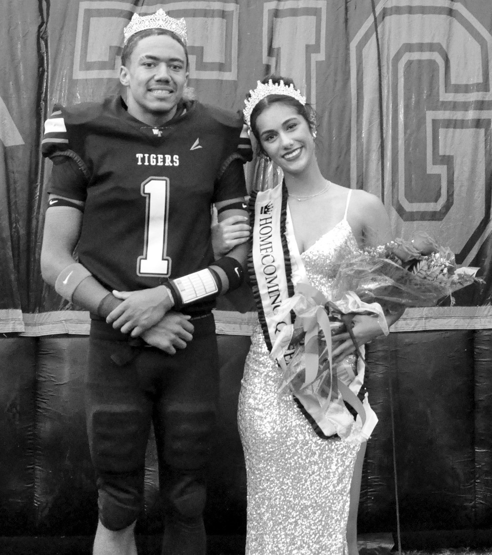 Nadim Bruner (left) and Emma Slovacek were crowned Wewoka High School’s Homecoming King and Queen just before Friday night’s game against Wayne. The Wewoka Tigers dominated the Wayne Bulldogs 46-20. —Staff Photo by Bill Anderson
