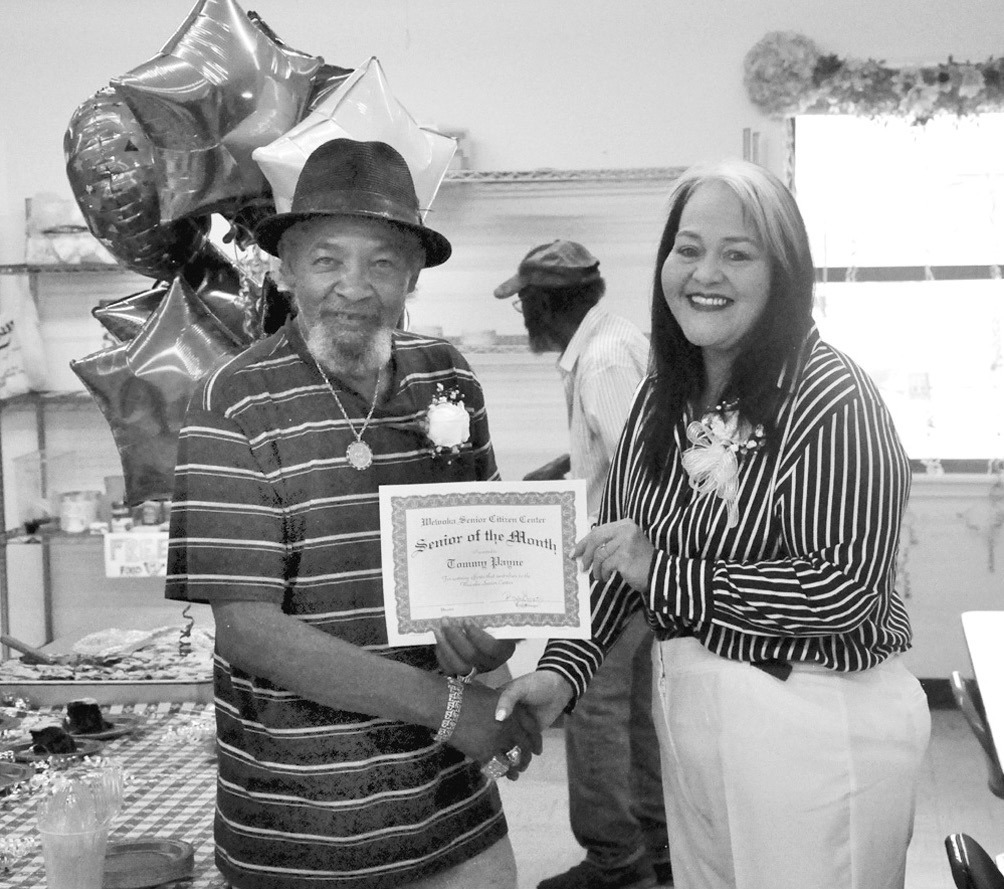 Tommy Payne was named the Wewoka Senior Citizens Center’s “Senior of the Month” on May 1. City Manager Rebecca Stone presented Payne with a special certificate and he will park in a special parking spot for the entire month. —Staff Photo by Bill A