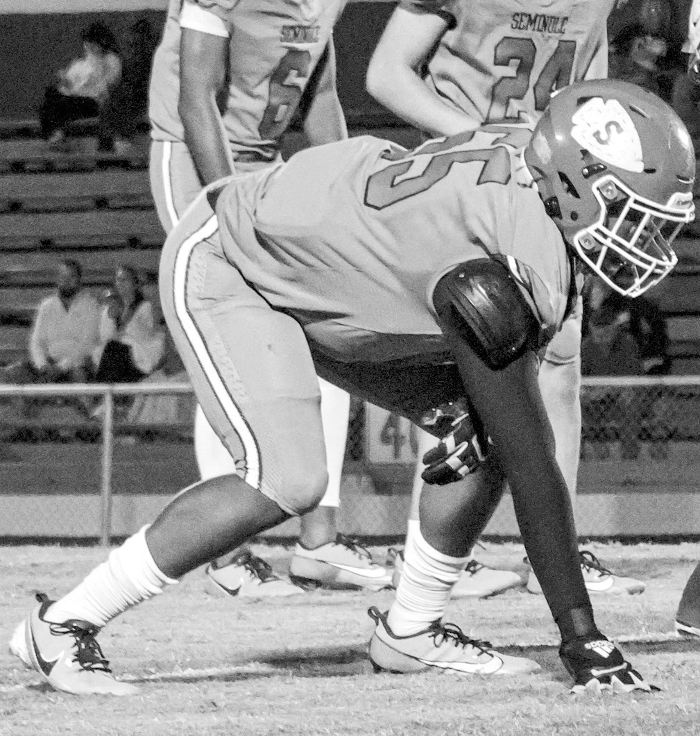 Seminole DE Ty Washington gets ready to rush the Checotah passer in Friday night’s game. (Photo by Ben Schatzel)