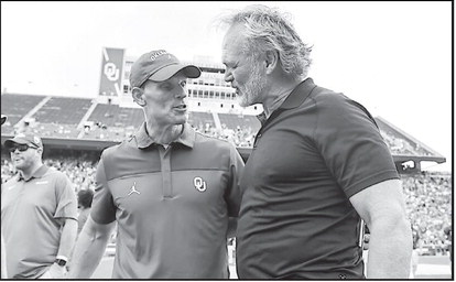 Oklahoma Head Coach Brent Venables and Brian Bosworth