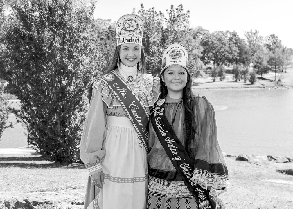 Miss Choctaw Nation Mia Reich (left) and Miss Seminole Nation Alivia Wapskineh stand in front of the south pond on Seminole State College’s campus. Both are President’s Leadership Class scholarship recipients who balance campus involvement with service to their tribal communities. (Photo provided)