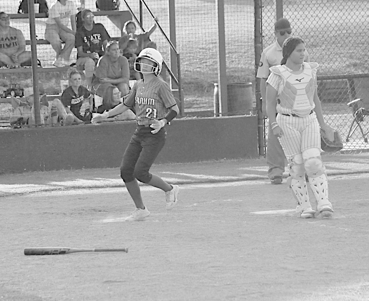 Varnum Lady Whippet Karsyn Lowery scores a run for Varnum. Staff Photo by Bill Anderson