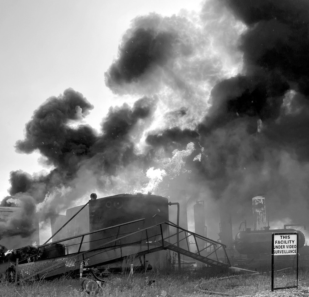 Multiple fire departments from across the Seminole County responded to a tank battery fire near Highway 9 and NS 3640 late Tuesday night. The glow from the blaze, caused by a lightning strike, was reportedly visible for miles. —Photo courtesy Aaron Sowd