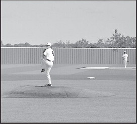 Seminole Chieftain pitcher Landon Bowling winds up for the pitch Friday evening. Staff Photo by Bill Anderson