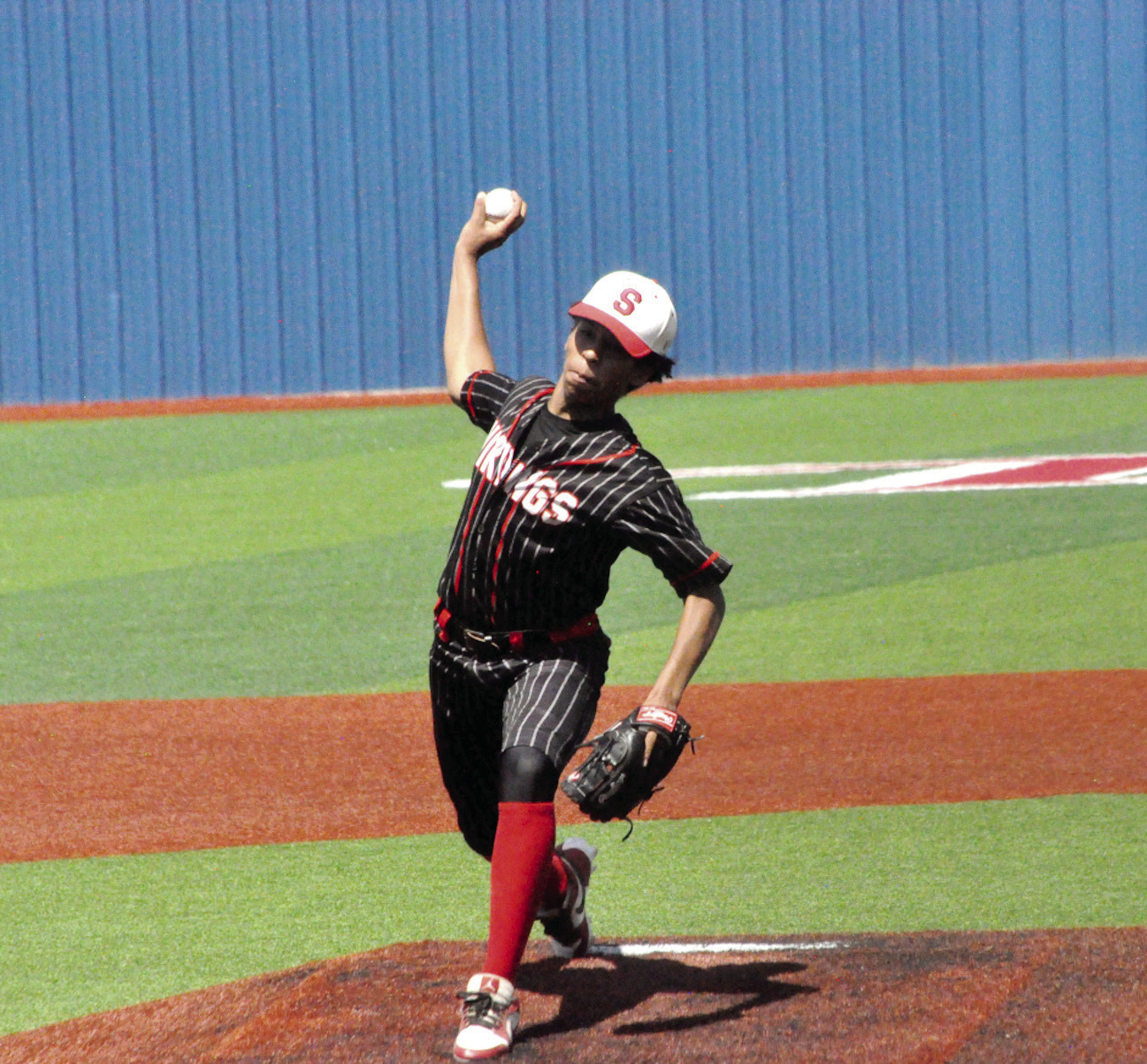 Sasakwa Viking pitcher Titan Collins throws the fast ball against Boswell Friday afternoon. Staff Photo by Bill Anderson