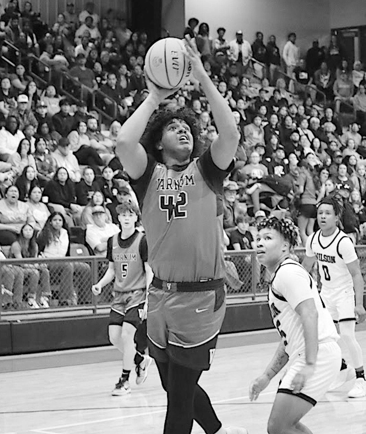 Varnum Whippet Jon Madkins gets the rebounds and makes the shot Saturday night. Courtesy Photo by Jeanne Gosa