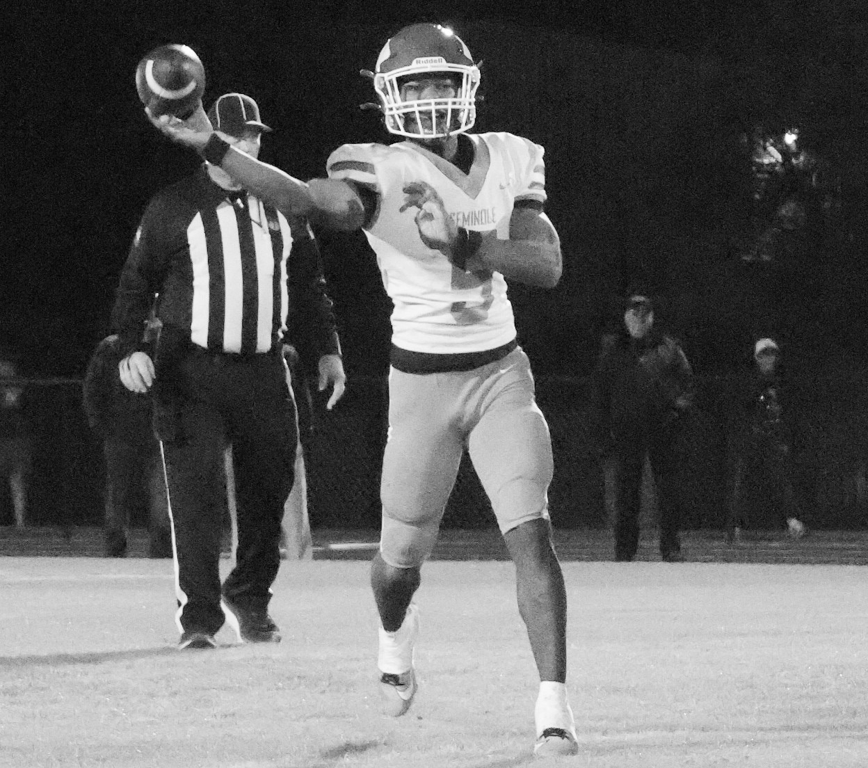 Seminole Chieftain Quarterback Dontre Garfield finds an open receiver down field Friday night. Courtesy Photo by Ben Schatzel