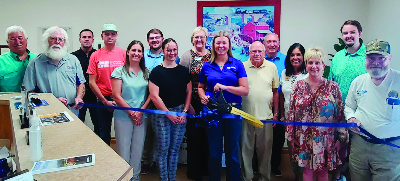 Seminole County Farm Bureau Agent Karley Fewel (center) was joined by friends, community leaders and members of the Seminole Chamber of Commerce for a ribbon cutting ceremony Thursday, Sept. 18. Fewel’s office is located at 1801 W. Wrangler Blvd. —Cou