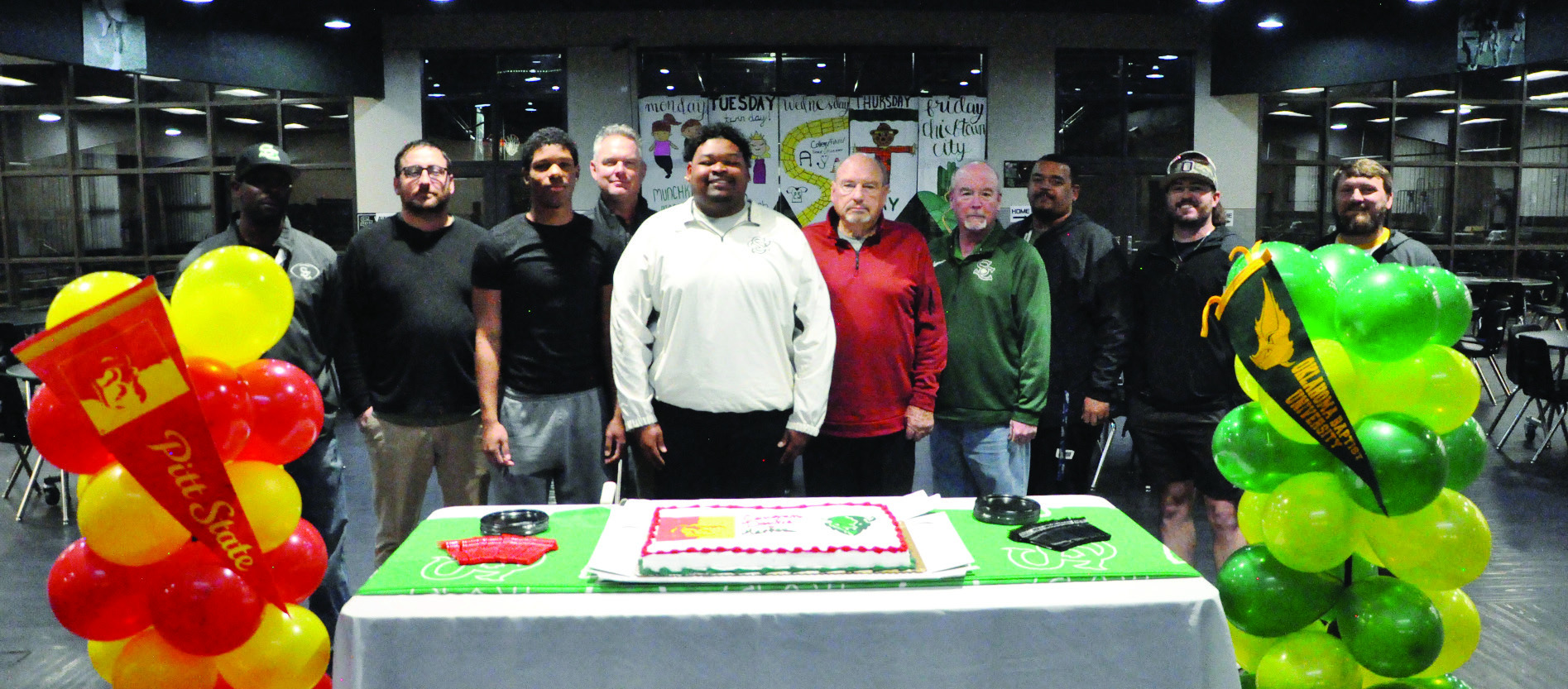 Seminole Football had 2 signings Wednesday. Dontre Garfield signed his letter of intent with Pittsburg State and Martez Johnson signed his letter with OBU. Pictured is Dontre and Martez with Seminole High School coaches. Staff Photo by Bill Anderson