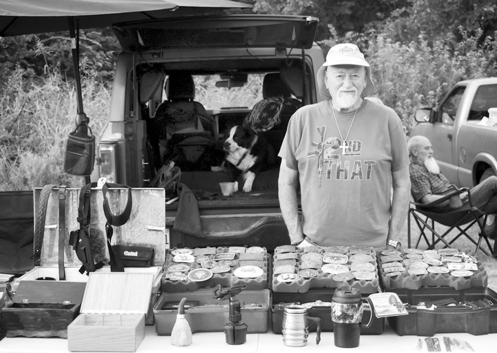 Above, Phil Cheatham sells his wares at Highway 9 Antiques in Seminole. The market will stage its 8th anniversary celebration this Saturday, Aug. 9. (Staff photo by Andy Wilson).
