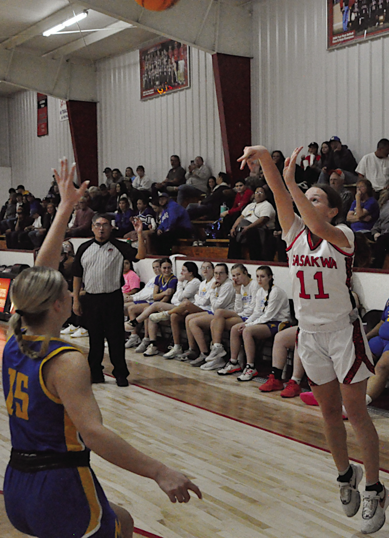 Sasakwa Lady Viking Addy Odom shoots the threepoint shot Tuesday night against Moss Staff Photo by Bill Anderson