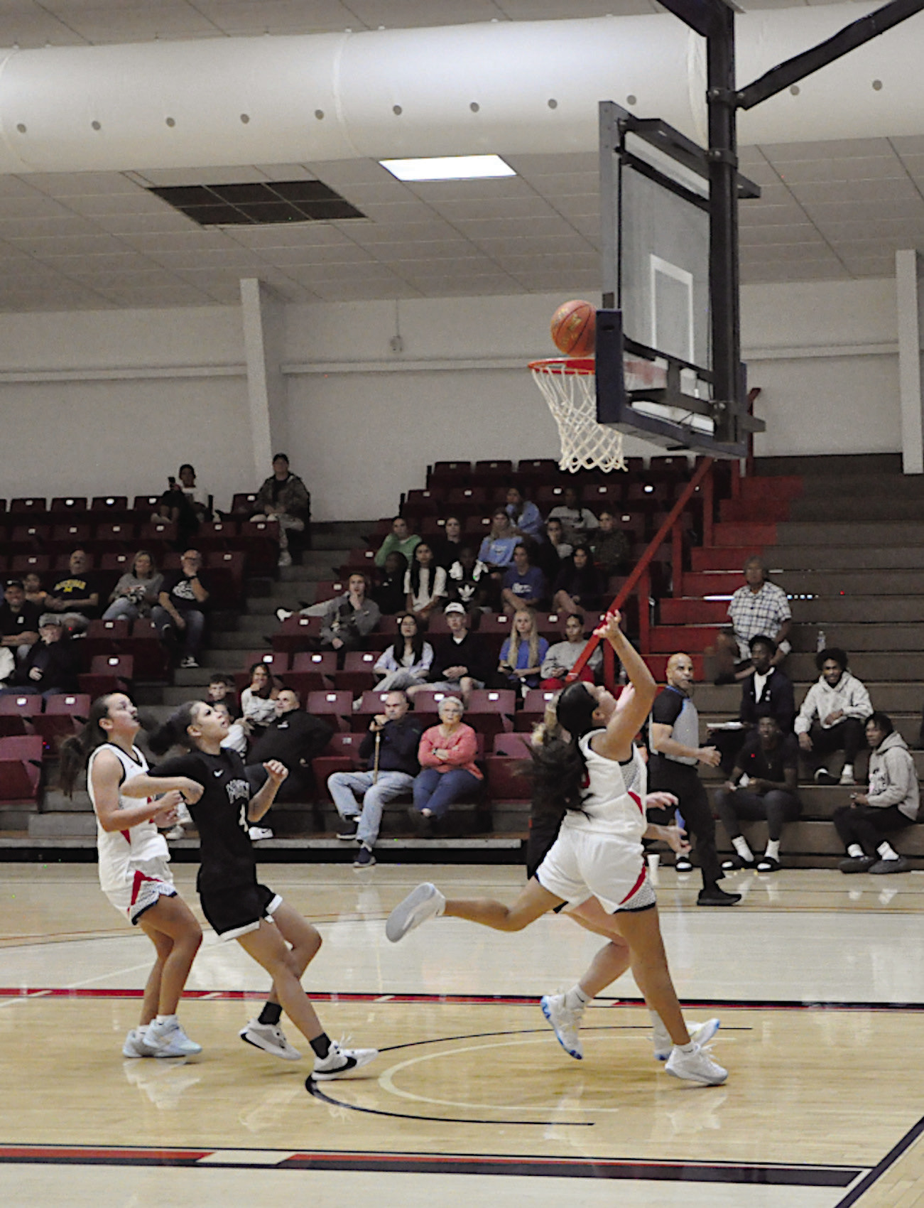 Seminole State Belle Nazhoni Sleeper flies in for the layup Monday night. Lady Belles won 105-47. Staff Photo by Bill Anderson