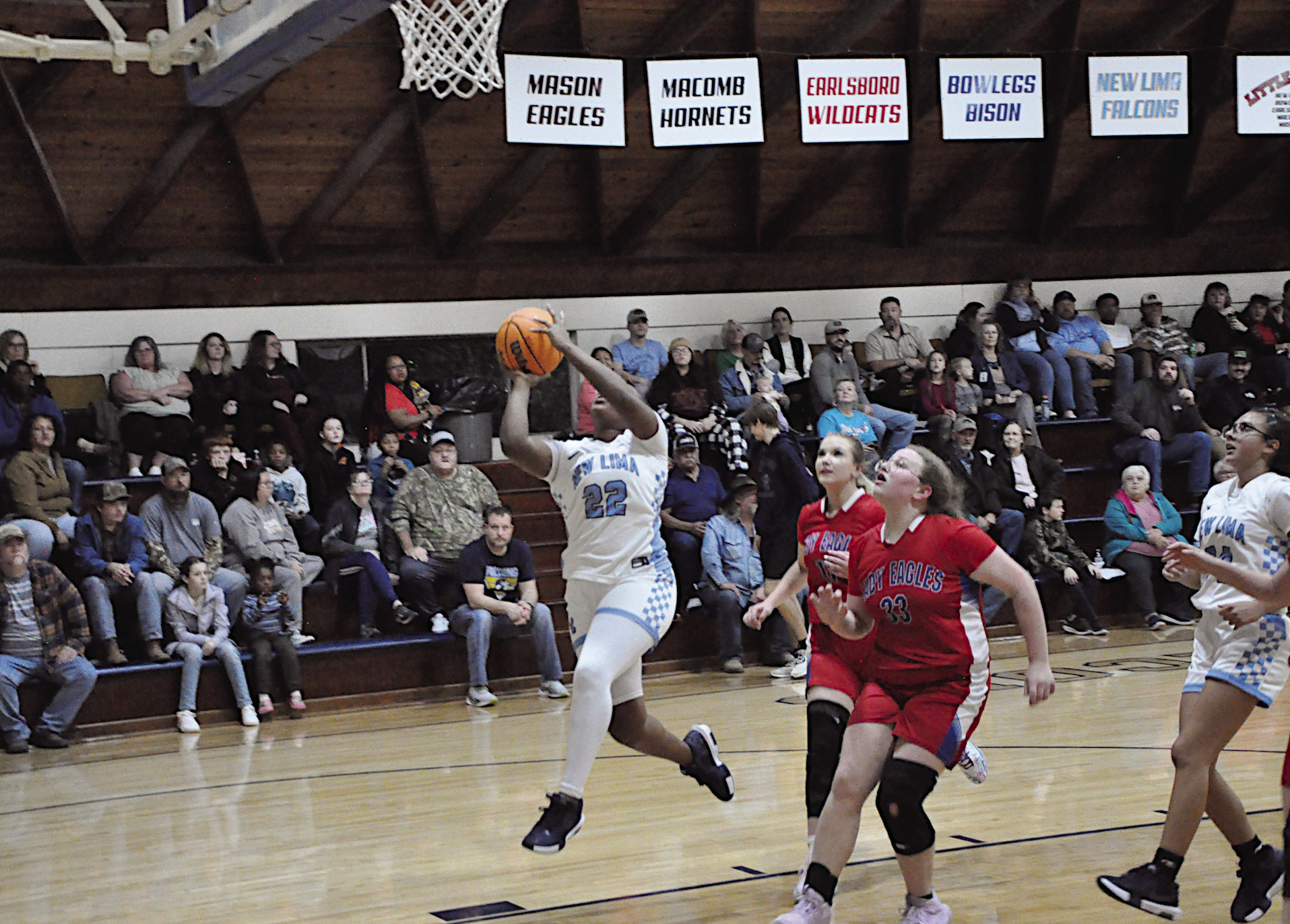 New Lima Falconette Aubrey Washington flies in for the layup Thursday night against Life Christian. Staff Photo by Bill Anderson