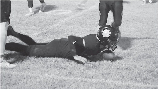 Maud Tiger Quarterback Trenton Marshall punches the ball in for the touchdown Friday night against the Bluejacket Chieftains. Maud won 46-28. Staff Photo by Andy Wilson