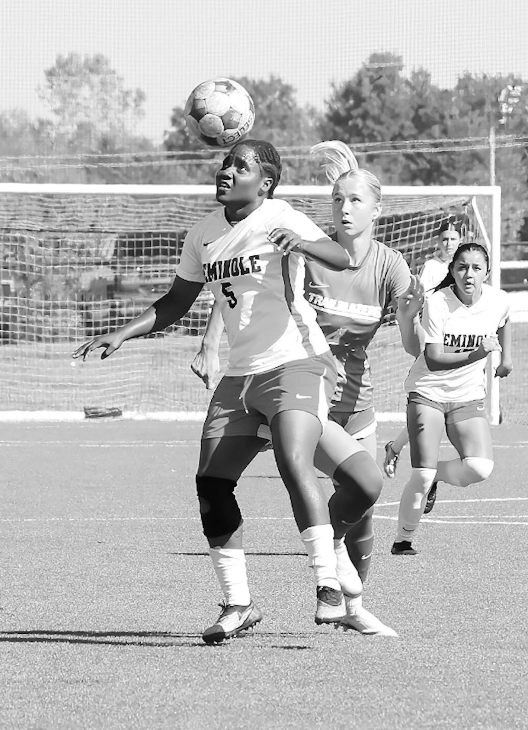 Seminole State Lady Trojan Fredricka Finnikin uses her head to control the ball. Courtey Photo by Glen Bryan