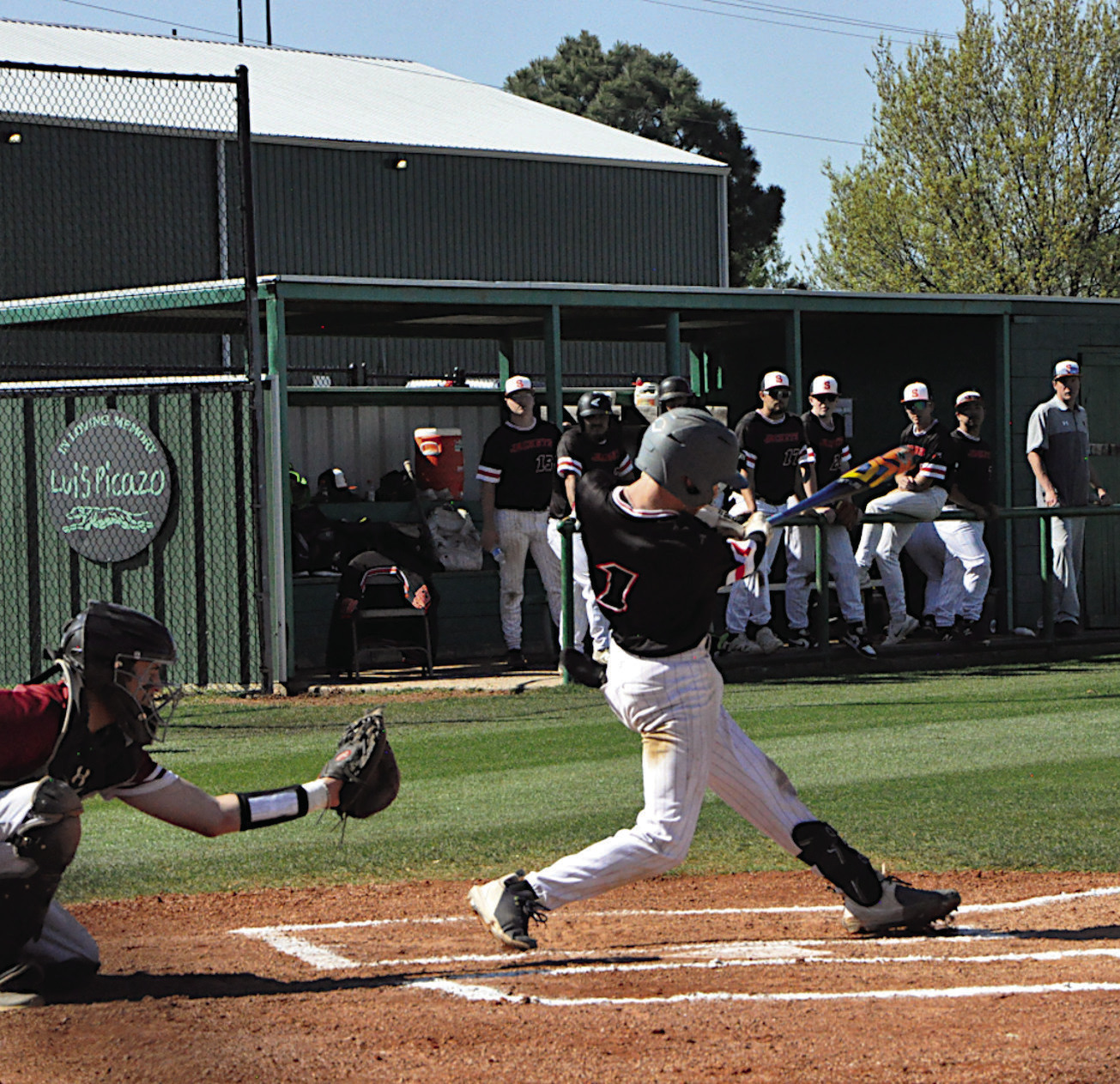 Strother Yellowjacket Peyton Moody knocks the ball into the outfield Thursday. Staff Photo by Bill Anderson
