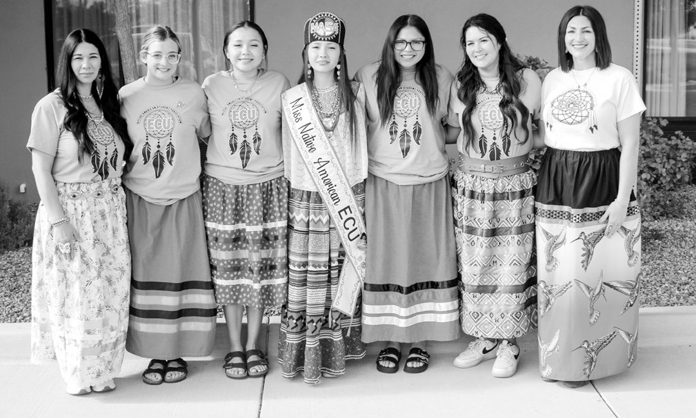 Pictured: Olivia Terry, Adelyn Hernandez, Mena Cedartree, Miss Native American ECU Gabrielle Nucosee, Taloa Lewis, Kala Furr and Dr. Destany Schafer-Morgan. (Photo provided)