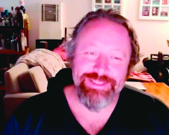 Above: Matt Axton, son of acclaimed singer/ songwriter and actor Hoyt Axton, tells the story of “Joy to The World” during a recent Zoom call with the Seminole Producer’s editor. Right: Matt in performance.