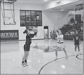 Wewoka Lady Tiger Emma Slovacek shoots the ball from three-point range Monday night. Staff Photo by Bill Anderson